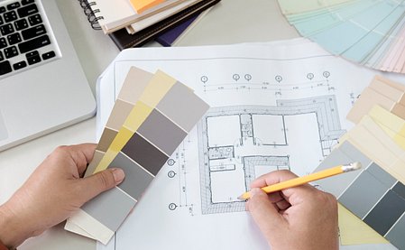 graphic-design-color-swatches-pens-desk-architectural-drawing-with-work-tools-accessories